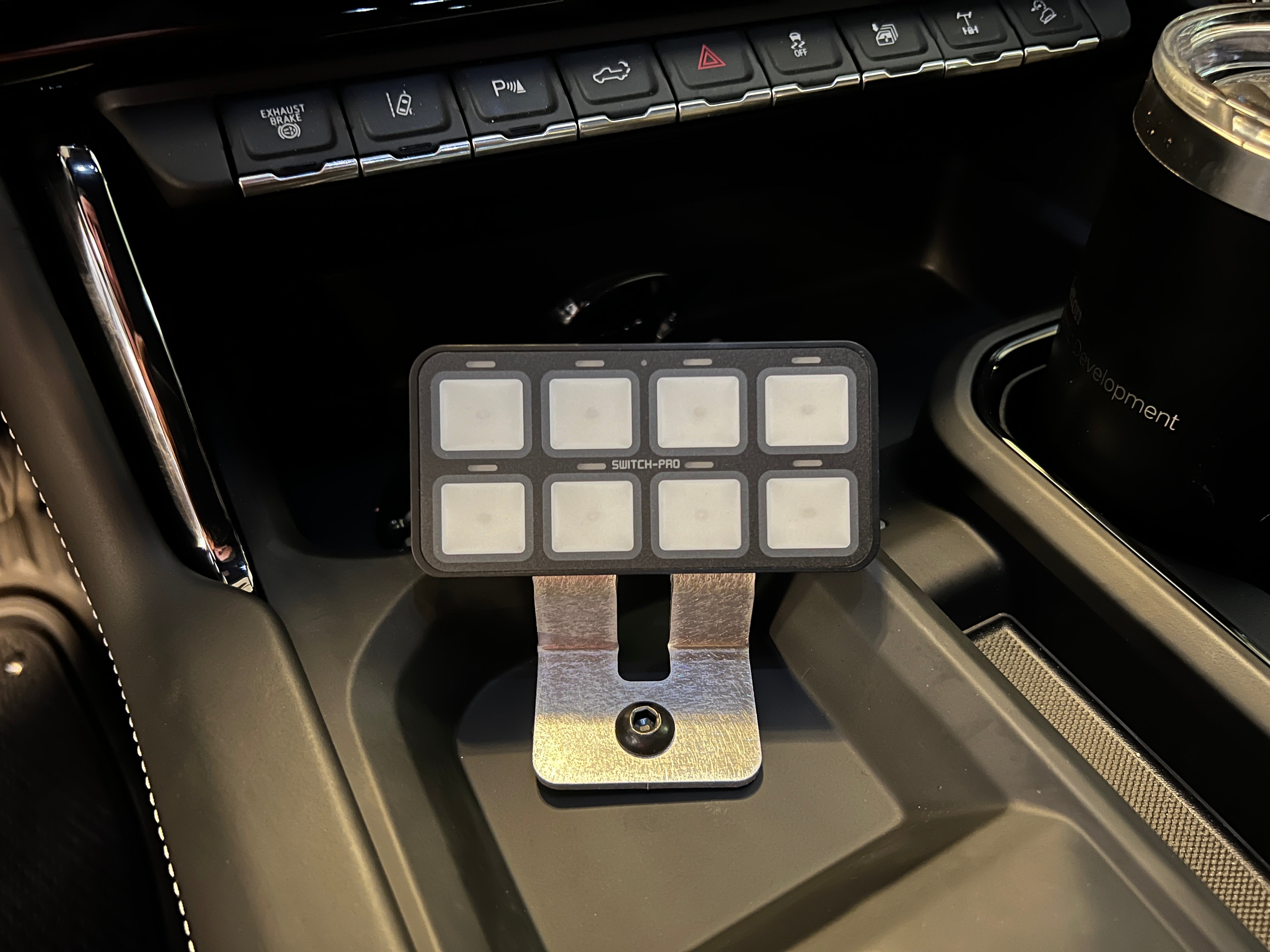 Pivotable Mounting point for Switch Pros touch panel in Chevy and GMC trucks