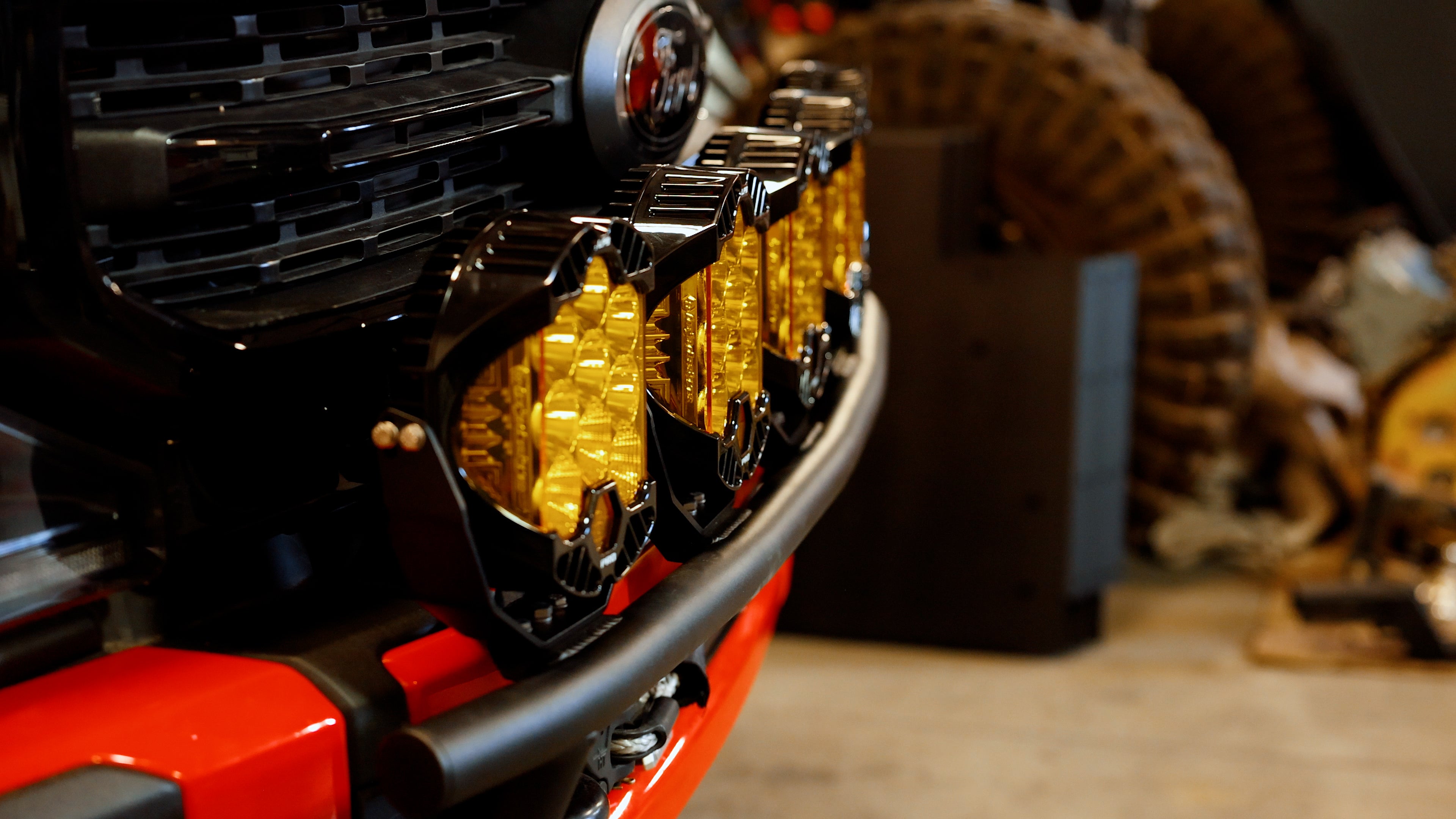 Amber LP9s mounted on GODZ MFG front bumper light mount for Ford F250, F350, F450, F550