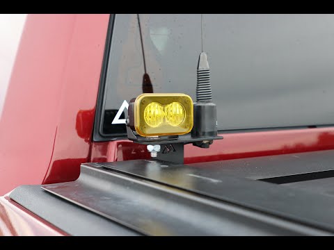 universal chase light and antenna bracket for pick up truck